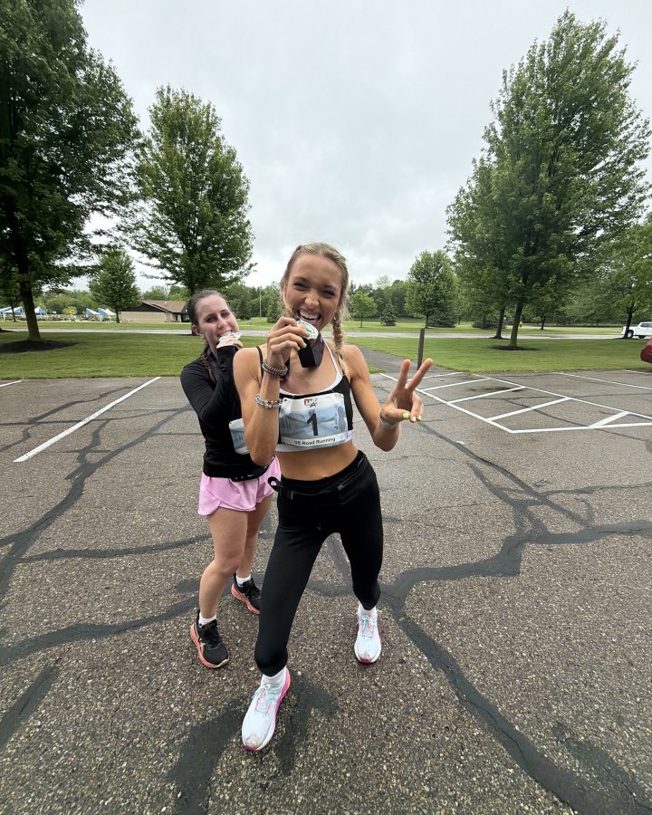 Jade Williams at Luau 5K, 10K, & 13.1M at Lansing, MI (21) - 05/23/2026 after earning 1st FEMALE Overall
