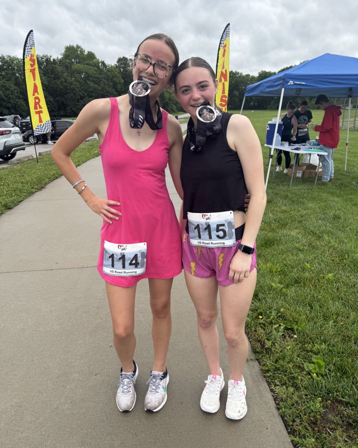 Carly Wieland at Medal Madness 5K, 10K, & 13.1M at Kansas City, MO (22) - 05/30/2026 after earning 2nd FEMALE Overall