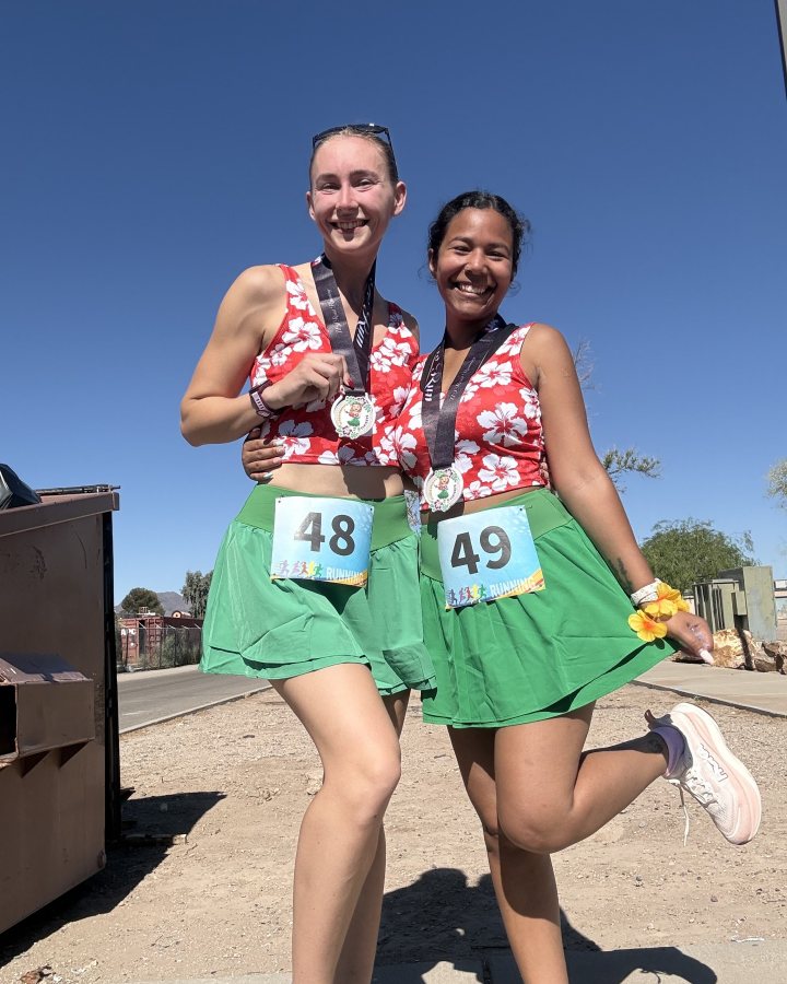 Terri Goldman and Trinity Hicks at Luau 5K,10K & 13.1M at Tucson, AZ (20) - 05/16/2026 after earning Best Costume
