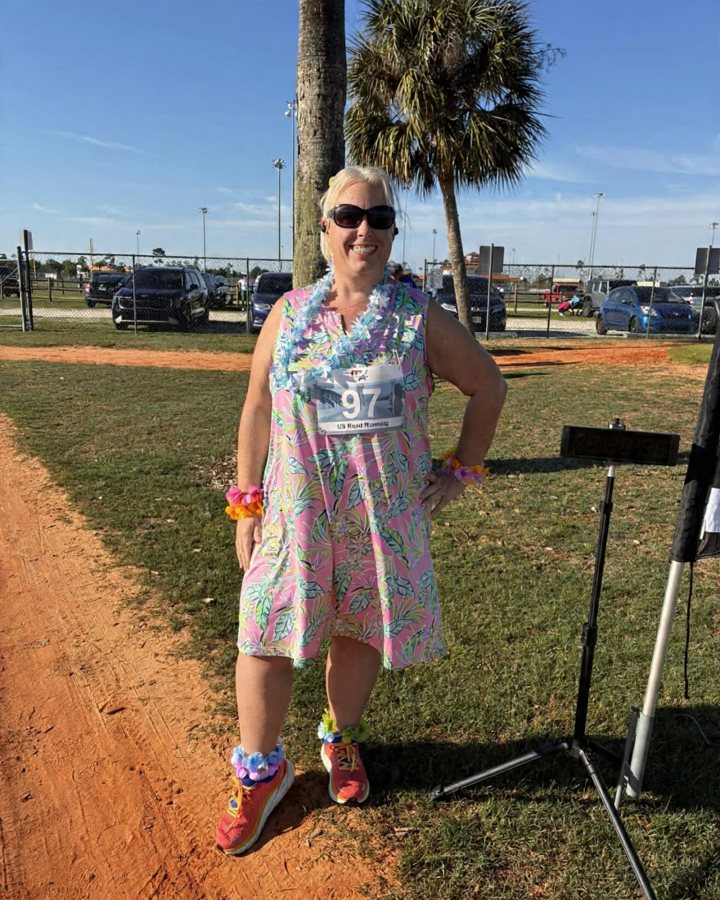 Malinda Sain at Luau 5K, & 10K at Panama City, FL (20) - 05/16/2026 after earning Best Costume