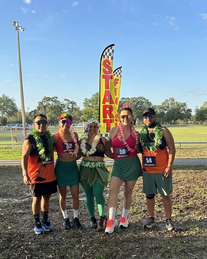 Alexandra Juarez at Luau 5K, 10K, & 13.1M at Hudson, FL (20) - 05/16/2026 after earning Best Costume