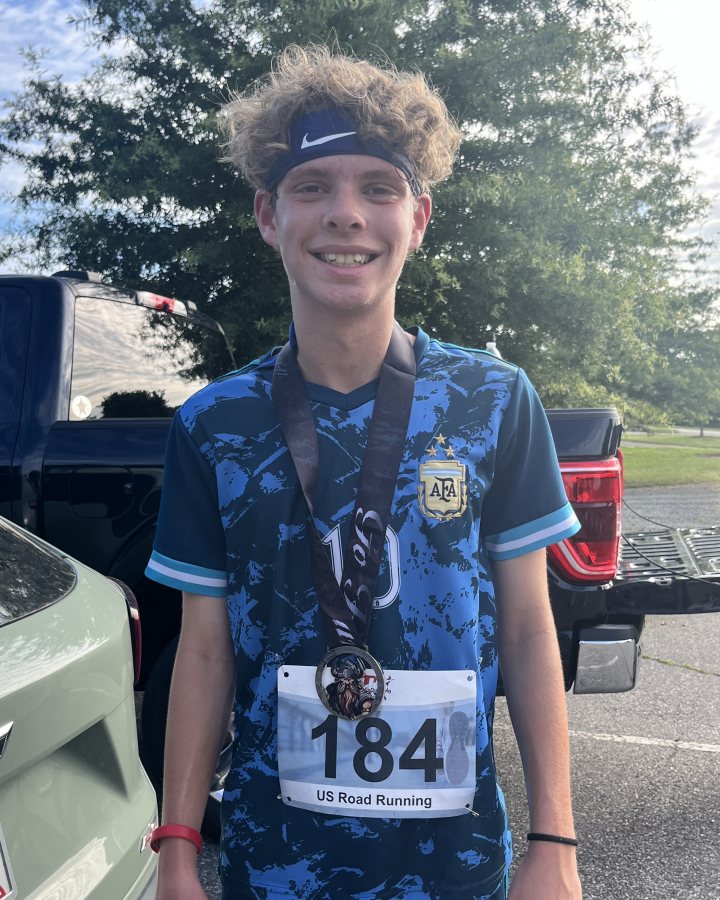 Rocco Holbrook at Medal Madness 5K, 10K, & 13.1M at Winston-Salem, NC (24) - 06/13/2026 after earning 2nd MALE Overall